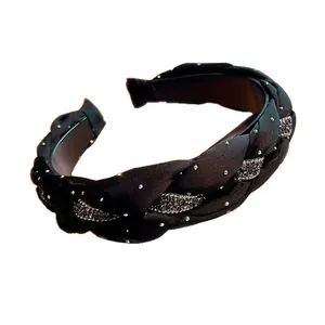 Elegant black braided headband with shimmering rhinestones for women's hair accessories