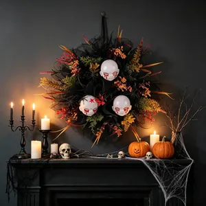 Spooky Halloween wreath featuring three bleeding doll heads on black mesh decoration