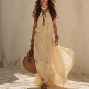 Elegant cream bohemian pleated halter maxi dress featuring a flowing and airy silhouette