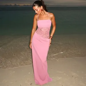 Elegant pink maxi dress with lace patchwork and halter neck for beach vacations