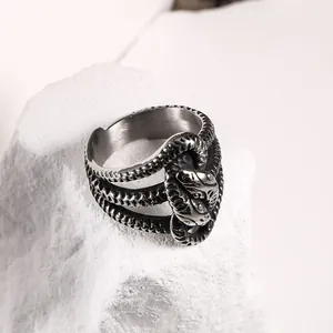 Vintage stainless steel snake ring featuring a wrap-around design and punk rock aesthetic