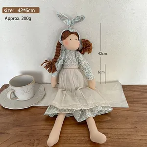 Adorable handmade Korean style fabric doll wearing floral dress and lace apron gift for kids