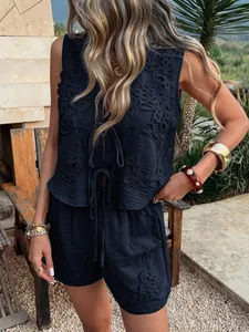 Detailed view of navy blue boho embroidered vest and shorts set for summer vacations.