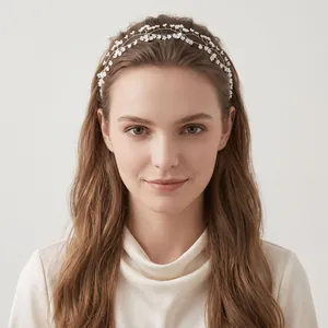 Elegant detail showing a hand-woven double-layer floral bridal headband on a bride.