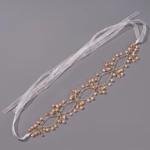 Elegant handmade bridal hairband with double-layered peach flowers and white ribbons