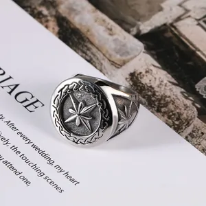 Vintage silver octagram signet ring for men featuring an engraved compass star design