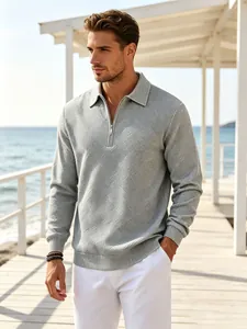 Men's vintage grey polo sweater with half-zip and jacquard textured knit pattern.
