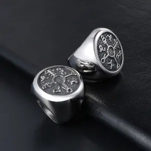 Vintage style titanium steel signet ring for men featuring engraved mystical symbols
