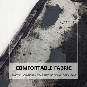Dettaglio macro del tessuto denim elastico con esclusivo motivo lavaggio nero e grigio