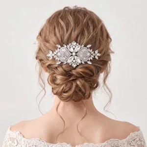 Detailed view of elegant bridal hair comb with rhinestones and pearls on a blonde bun