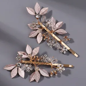 Exquisite handmade bridal hair clips with vintage leaves, pearls and sparkling rhinestones