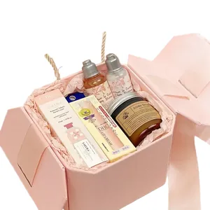 Boîte cadeau hexagonale rose élégante avec ruban pour cadeaux d'entreprise de luxe