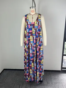 Detailed view of long sleeveless dress featuring colorful geometric rectangular pattern