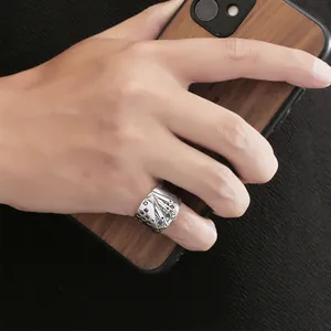 Vintage silver stainless steel ring with detailed poker card design for men's hip hop fashion