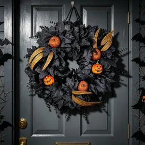 Spooky Halloween black maple leaf wreath featuring glitter pumpkins for front door decor