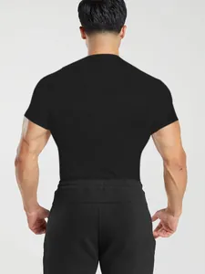 Back view of men's athletic quick-dry t-shirt in black with tight fit