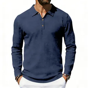 Close-up of navy blue linen long sleeve polo shirt showing breathable fabric texture.