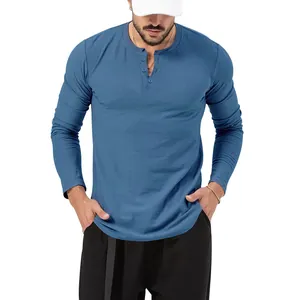 Slim fit men's long-sleeve blue Henley shirt with classic button placket and round neck.