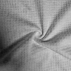 Macro view showing the premium heavyweight grey cotton fabric texture of a men's casual T-shirt