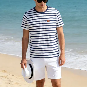 Men's casual blue and white striped short-sleeved T-shirt with pocket in a beach setting