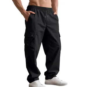 Detailed view of men's black quick-dry cargo pants with large functional side pockets