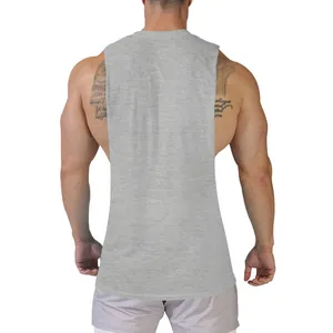Back view of a grey sleeveless fitness tank top worn by a muscular male model in studio.