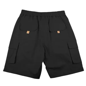 Back view of black cargo shorts for men with multiple utility pockets and elastic waist
