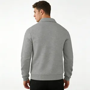 Back view of men's gray textured jacquard long sleeve polo shirt with ribbed cuffs