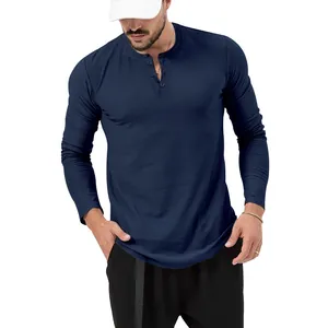 Close-up detail of a navy blue men's slim fit long sleeve Henley shirt with buttons