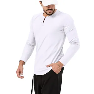 Detailed view of white slim fit men's long sleeve Henley shirt with button neckline
