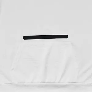 Detail shot of white waffle-knit fabric on men's hooded T-shirt with kangaroo pocket.