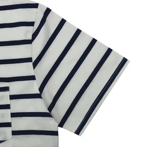 Close-up of men's navy blue and white striped short sleeve T-shirt with pocket.
