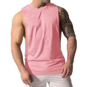 Detailed view of men's pink sleeveless gym workout tank top showing fit and texture