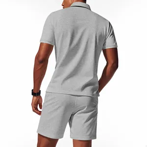 Back view of men's light gray waffle knit polo and shorts set for summer fashion