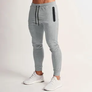 Men's slim fit light grey sports joggers with zipper pocket for gym and fitness training
