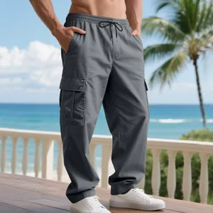 Full-length view of grey cargo pants with side pockets on a coastal terrace