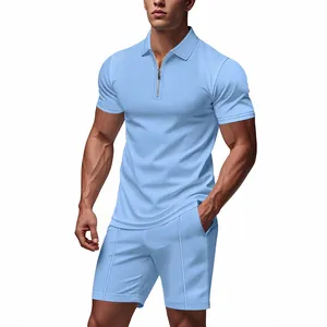 Detail showing men's light blue waffle knit polo shirt and matching shorts set on model