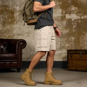 Men's khaki cargo shorts with functional side pockets, styled with rugged outdoor boots.