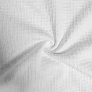 Detailed texture of high-quality white waffle knit fabric for casual men's summer t-shirt