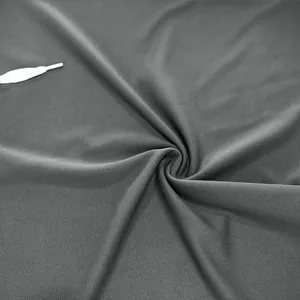 Detailed macro shot of breathable grey mesh fabric texture for men's sport hoodie