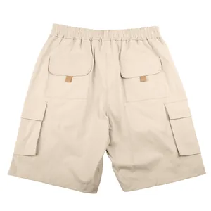 Detailed back view of men's beige multi-pocket cargo shorts for outdoor activities