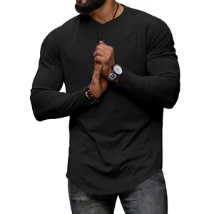 Macro detail of men's casual black long-sleeved T-shirt showing round neck fit