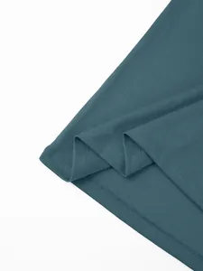Close-up detail of breathable mesh fabric and hem stitching on blue quick-dry polo shirt