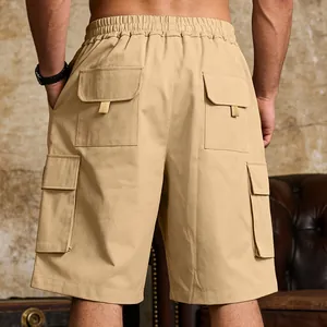 Detail view of men's khaki cargo shorts with multiple utility pockets and elastic waist