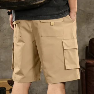 Detailed view showing back and side pocket design on men's khaki cargo shorts now