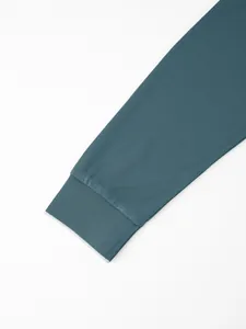 Close-up detail of a ribbed sleeve cuff on a men's quick-dry long sleeve Polo shirt.