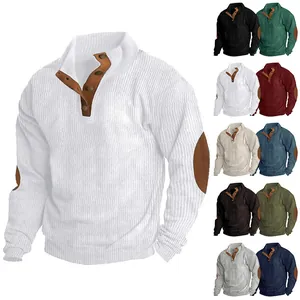 Detail view of men's corduroy sweatshirt with stand collar and suede elbow patches