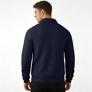 Back view of navy blue long sleeve polo shirt with textured jacquard pattern for men