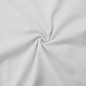 Close-up of soft white cotton knit fabric texture for men's casual crew neck t-shirt.