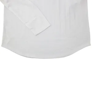 Close-up detail of white long sleeve casual T-shirt with a stylish curved hem design